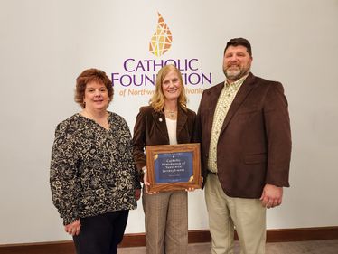 (l to r) Julia Cooney (Operations Director), Lisa Louis (Executive Director), and Jim Gallagher (Superintendent of Catholic Schools)